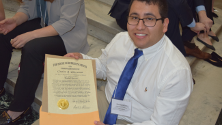 Kendall Brown research student award certificate at Posters at Capitol