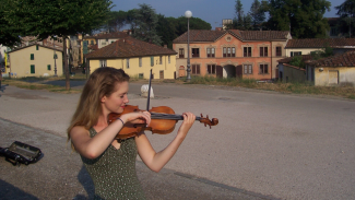 Summer Research Fellowships music performance abroad student playing violin