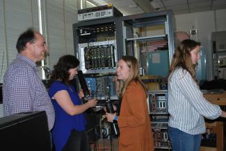 Physics undergraduate research summer fellows with mentor Chris Crawford