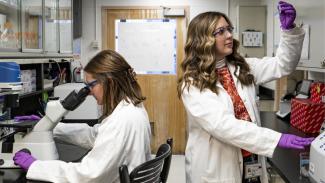 Madi Wilson Caroline Harper Hannon in the lab