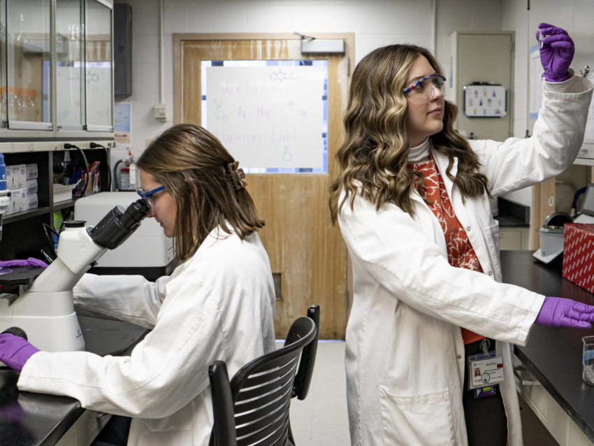 Caroline Harper and Madi Wilson, seniors in agricultural and medical biotechnology and human health sciences, pose for portraits in their lab on Friday, Feb. 28, 2025, at the Peter Bosomworth Health Sciences Research Building in Lexington, Kentucky