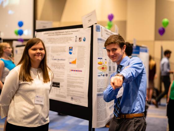 Joseph Walden and research partner presenting at Showcase of Undergraduate Research