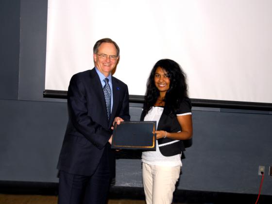 President Todd awarding undergraduate research student